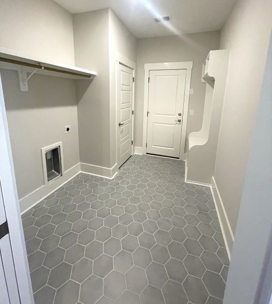 Representative unfurnished interior of a home built from the Marshall by Bill Clark Homes in Riverside Cove, Wilmington (Image 18).