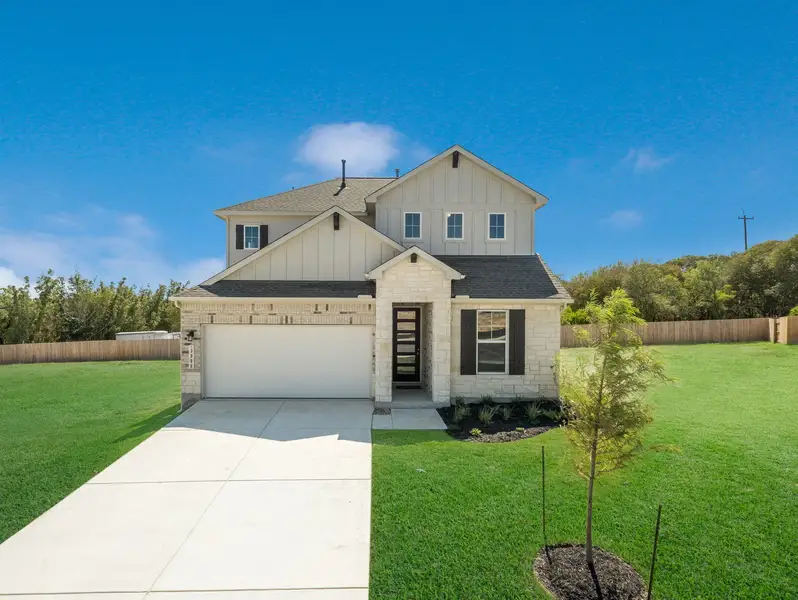 Representative exterior photo of a completed home built from the Pleasanton by Scott Felder Homes in Flora, Hutto, TX (Image 10).