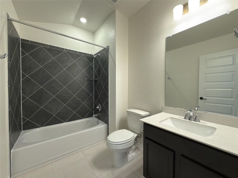 Furnished interior view inside a new home in River Bluff, Leander (Image 8).