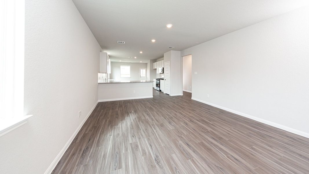 Family Room to Kitchen and Dining Area