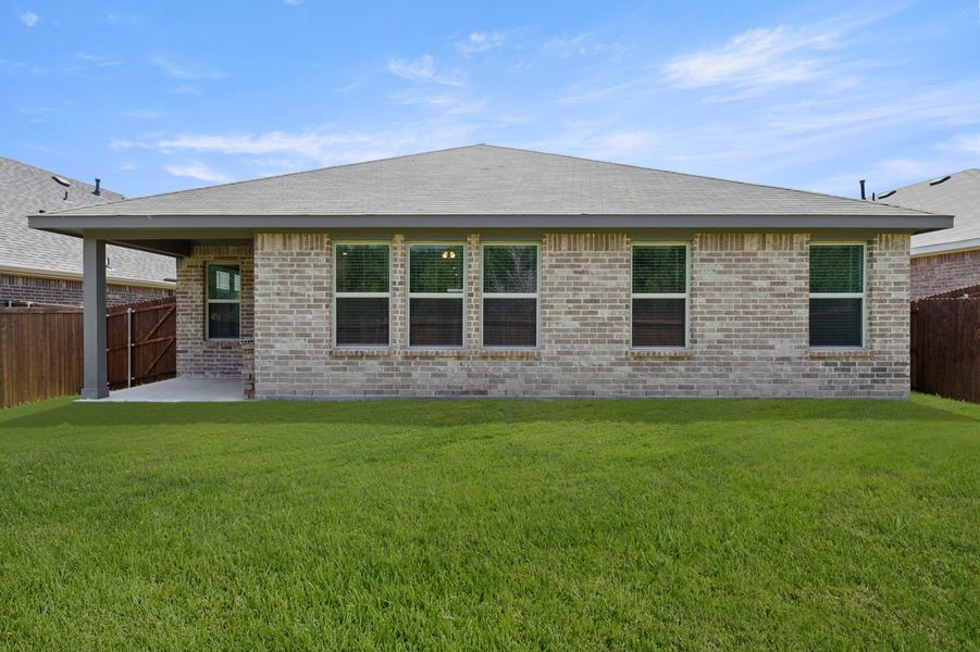 Front exterior of a new home in ValleyBrooke, Mesquite, TX, highlighting curb appeal (Image 26). Front exterior of a new home in ValleyBrooke, Mesquite, TX, highlighting curb appeal (Image 26).