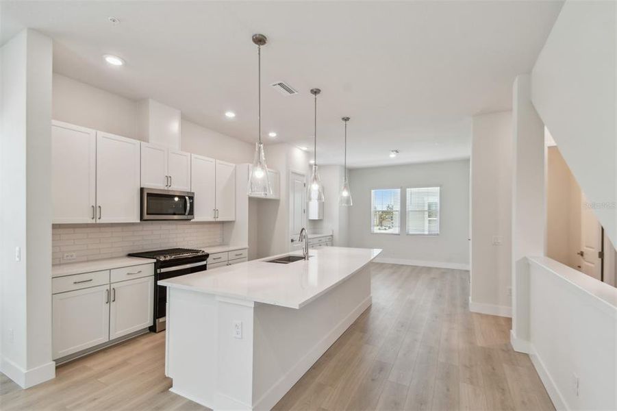 Furnished interior view inside a new home in Towns at Union, St. Petersburg (Image 3).