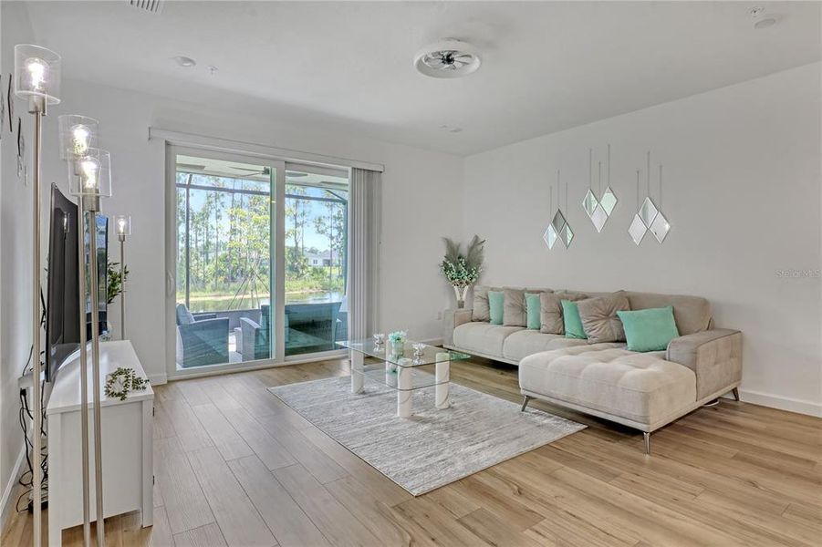 Furnished interior view inside a new home in The Timbers at Everlands, Palm Bay (Image 12).