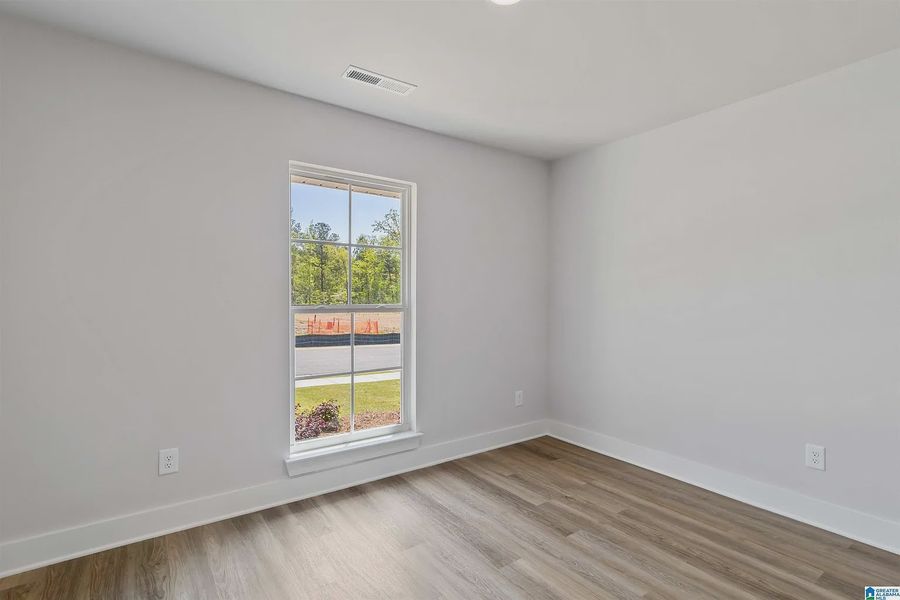 Representative unfurnished interior of a home built from the 1635-C by Adams Homes in Kirkland Farms, Alachua (Image 21).