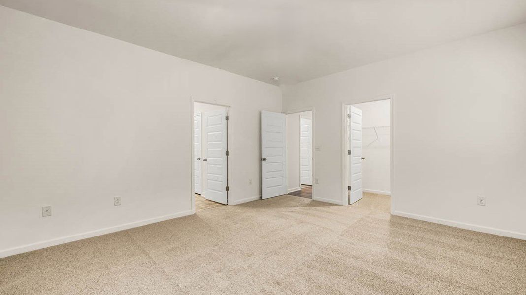 Representative unfurnished interior of a home built from the Dennis by D.R. Horton in Glenmaye, Hampton (Image 18).