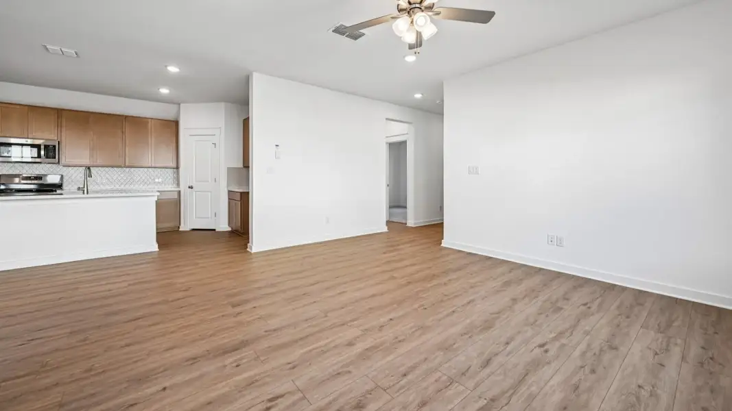 Furnished interior view inside a new home in Flora, Hutto (Image 13).
