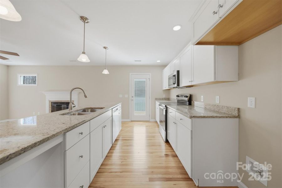Furnished interior view inside a new home in , Newton (Image 11).