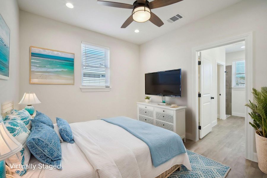 Virtually Staged Primary Bedroom with light wood-style flooring, visible vents, baseboards, ceiling fan, and recessed lighting Virtually Staged Primary Bedroom with light wood-style flooring, visible vents, baseboards, ceiling fan, and recessed lighting