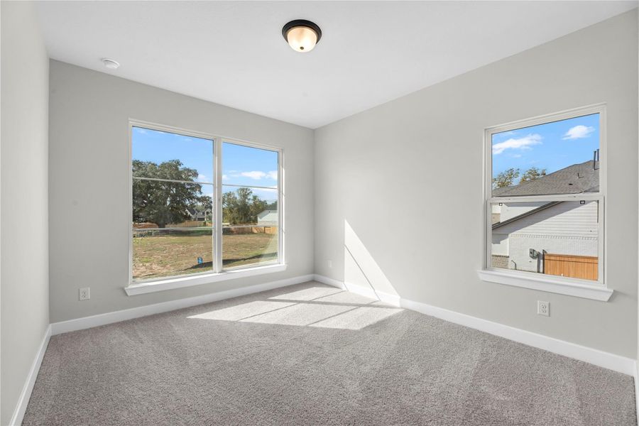 Spacious, unfurnished interior of a new home in Sienna, Missouri City (Image 11).