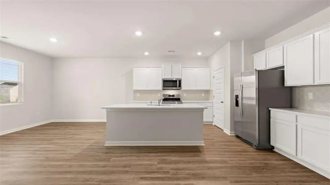 Furnished interior view inside a new home in Preserve at Dove Creek, Statham (Image 5).