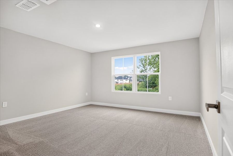 Spacious, unfurnished interior of a new home in Arden Woods, Greenville (Image 19).