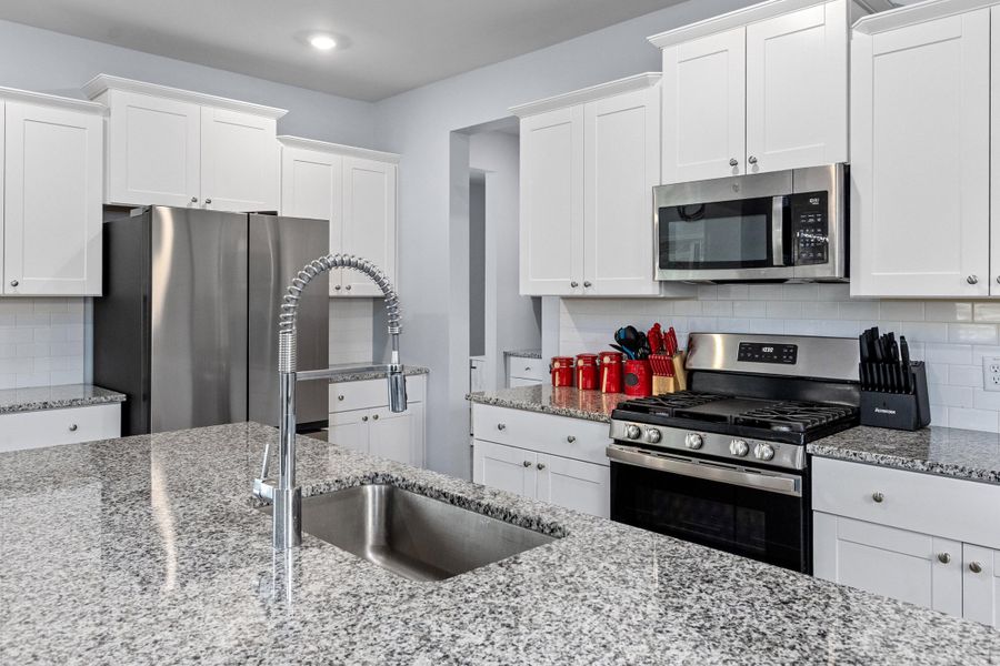 Furnished interior view inside a new home in Sweetgrass at Summers Corner, Summerville (Image 19).