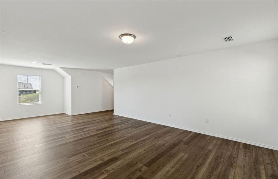 *Model representation. Some features and options may differ -Gathering room with view of main living areas