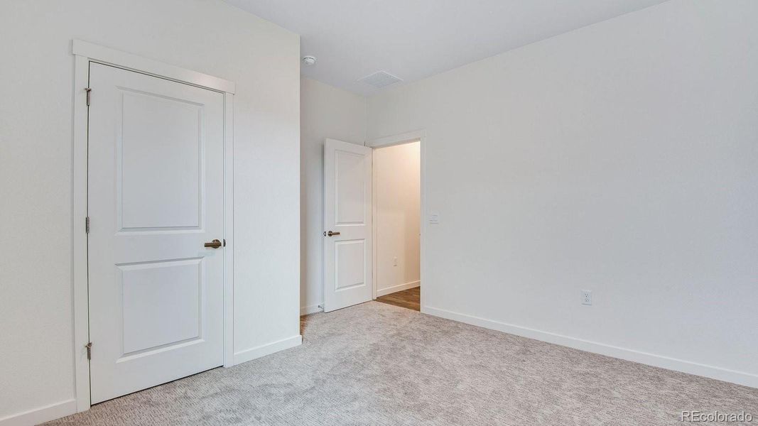 Spacious, unfurnished interior of a new home in Trails at Crowfoot, Parker (Image 21).