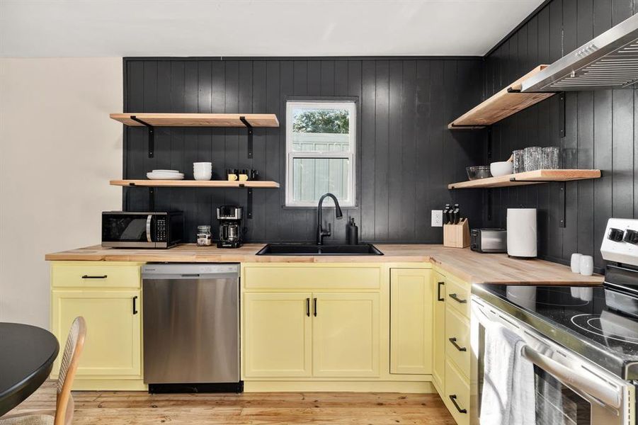 Lazy susan feature in the lower corner cabinet. High function. High style.