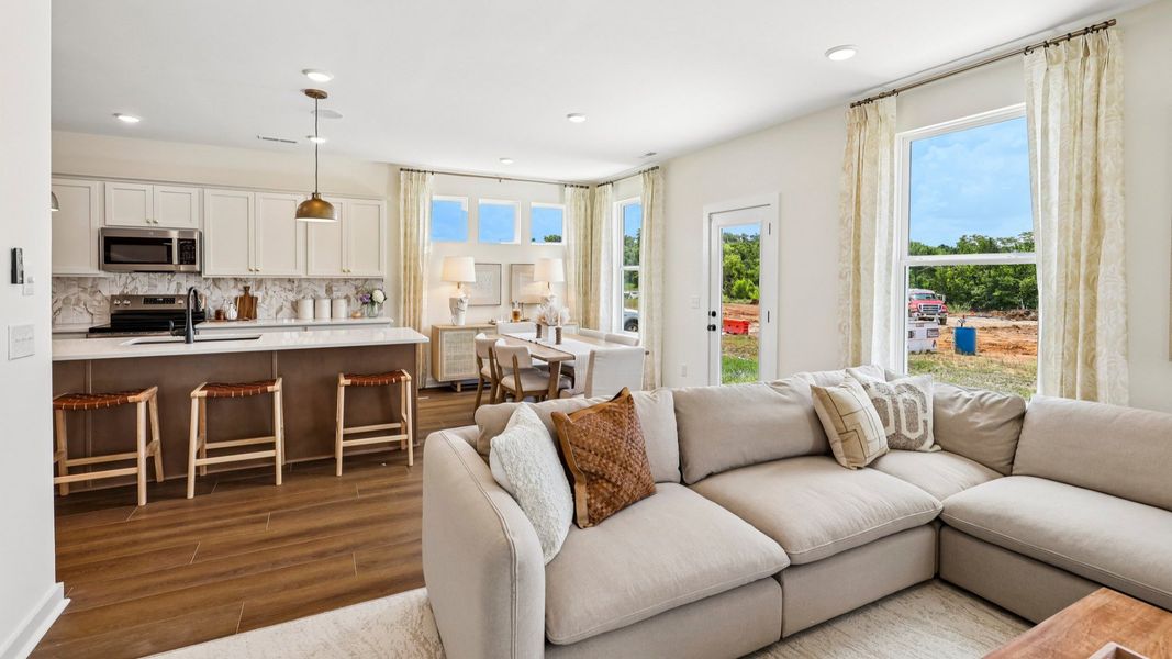 Gathering room with view of dining and kitchen areas Gathering room with view of dining and kitchen areas