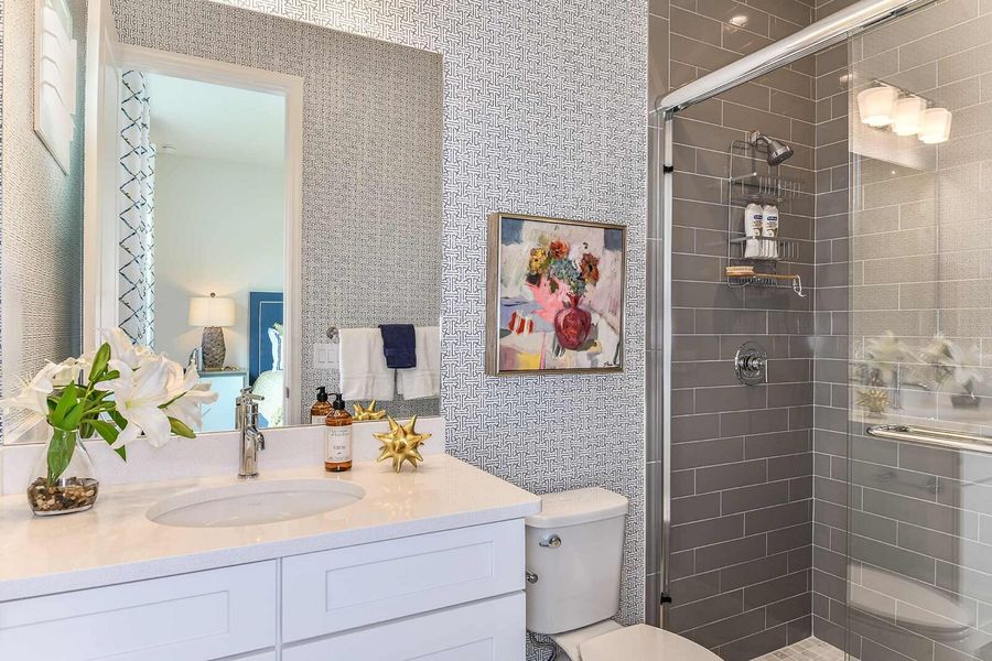 Representative furnished interior of a home built from the Savannah 2 by Neal Communities in SkySail, Naples (Image 14).