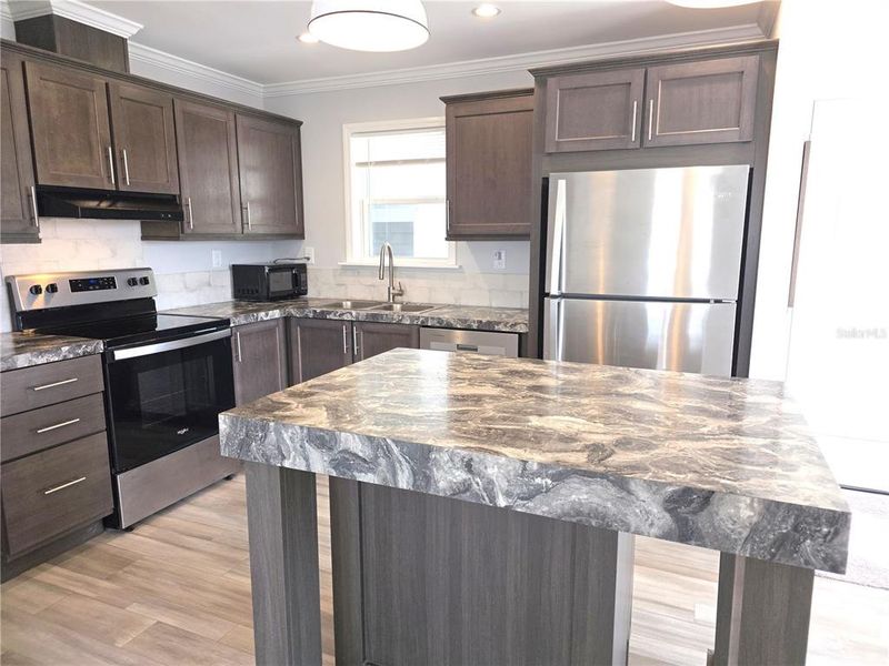 Furnished interior view inside a new home in , North Port (Image 6).