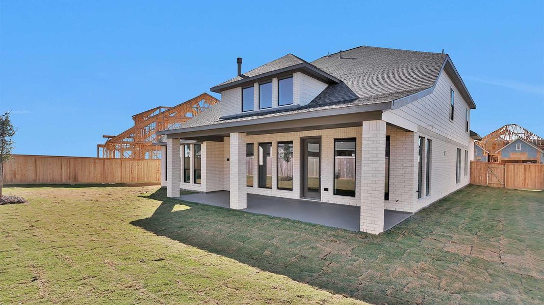 Exterior details and patio area of a home in Bridgeland, Cypress (Image 15).