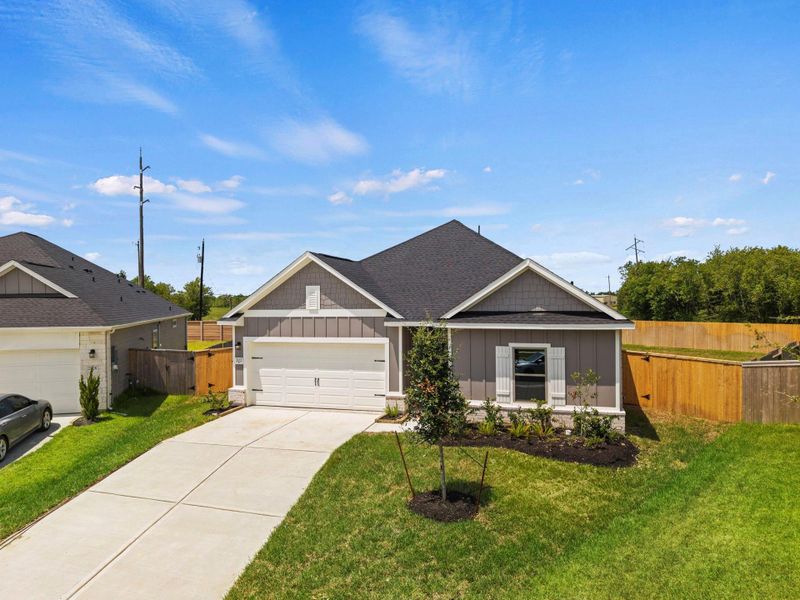 Front exterior of a new home in Laurel Landing, Alvin, TX, highlighting curb appeal (Image 20).
