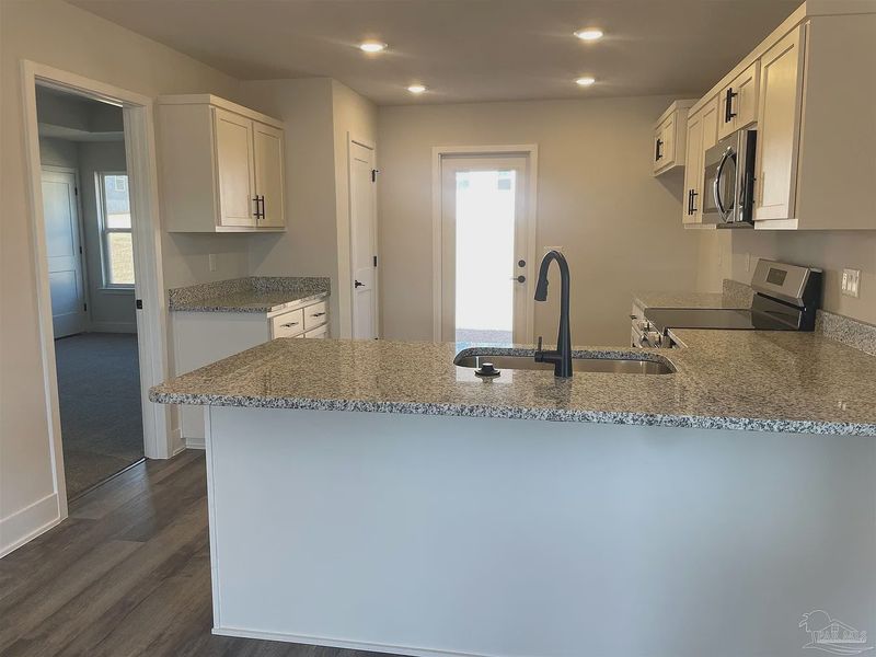 Furnished interior view inside a new home in Turtle Creek, Cantonment (Image 4).