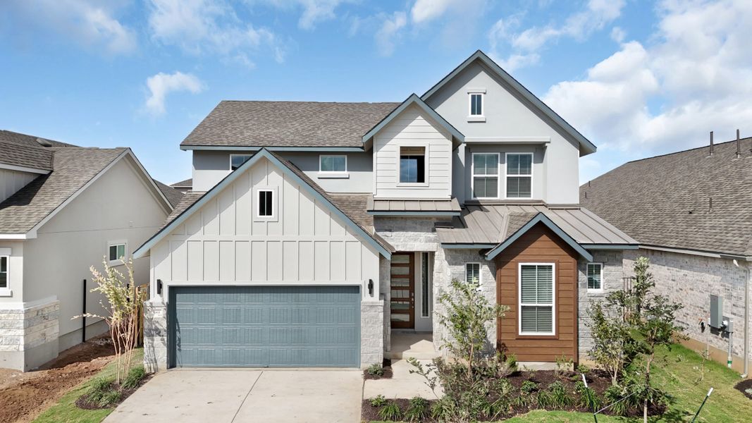 Front exterior of a new home in Santa Rita Ranch, Liberty Hill, TX, highlighting curb appeal (Image 12). Front exterior of a new home in Santa Rita Ranch, Liberty Hill, TX, highlighting curb appeal (Image 12).