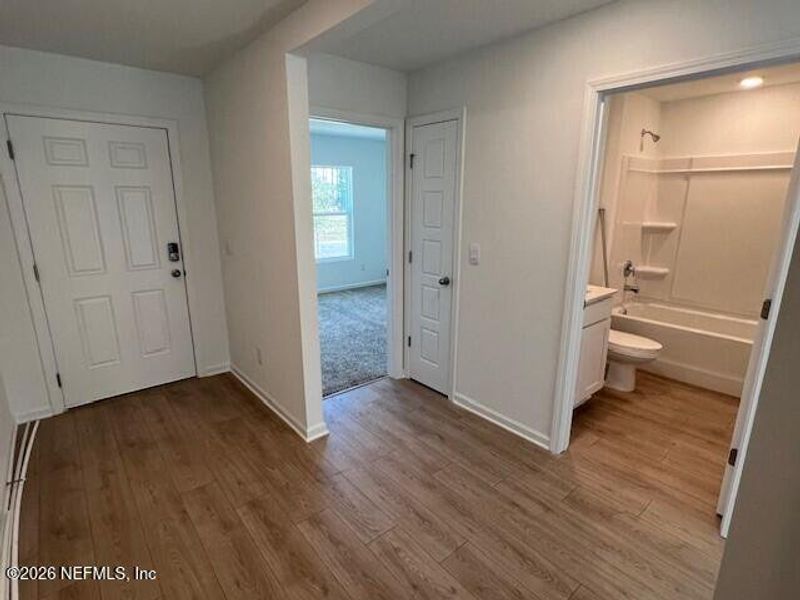 Spacious, unfurnished interior of a new home in Sawmill Branch, Palm Coast (Image 22).