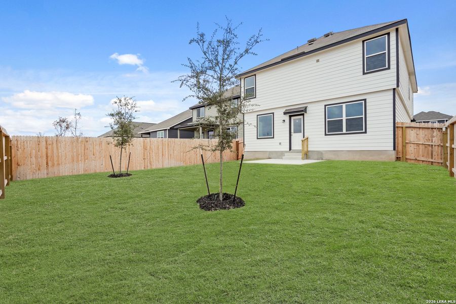 Exterior details and patio area of a home in Abbott Place, St. Hedwig (Image 3).