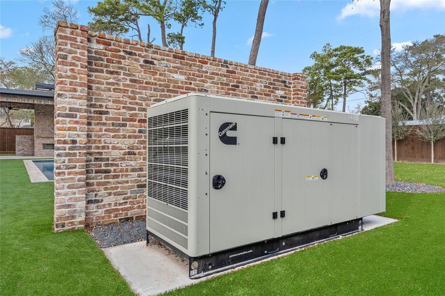 Living is comfortable and convenient in this thoughtful home thanks to a Cummins Quiet Connect generator, an Inclinator Elevator, four Navien tankless water heaters, and a Trane HVAC system.