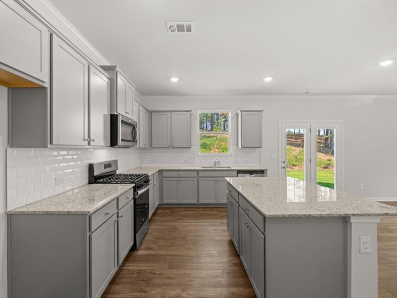 Furnished interior view inside a new home in Parkside at Carter Grove, Cartersville (Image 6).