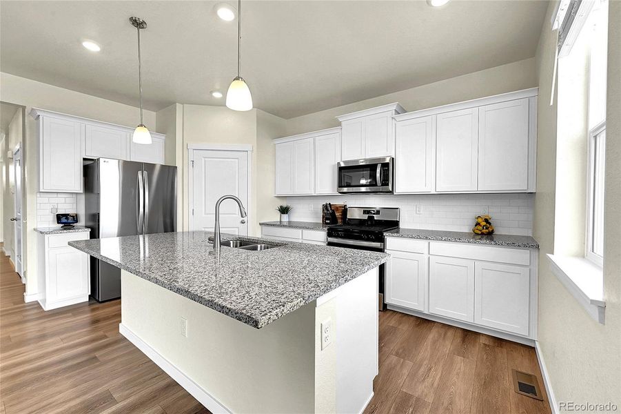 Furnished interior view inside a new home in Settlers Crossing, Commerce City (Image 8).