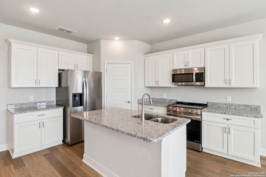 Furnished interior view inside a new home in Magnolia Village North, San Antonio (Image 12).