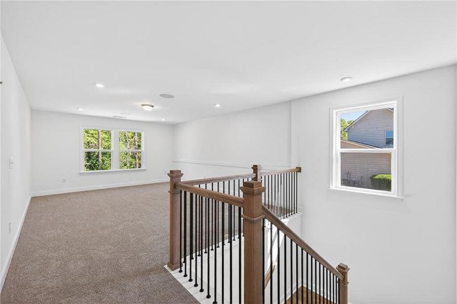 Spacious, unfurnished interior of a new home in Riversprings, Dacula (Image 36).