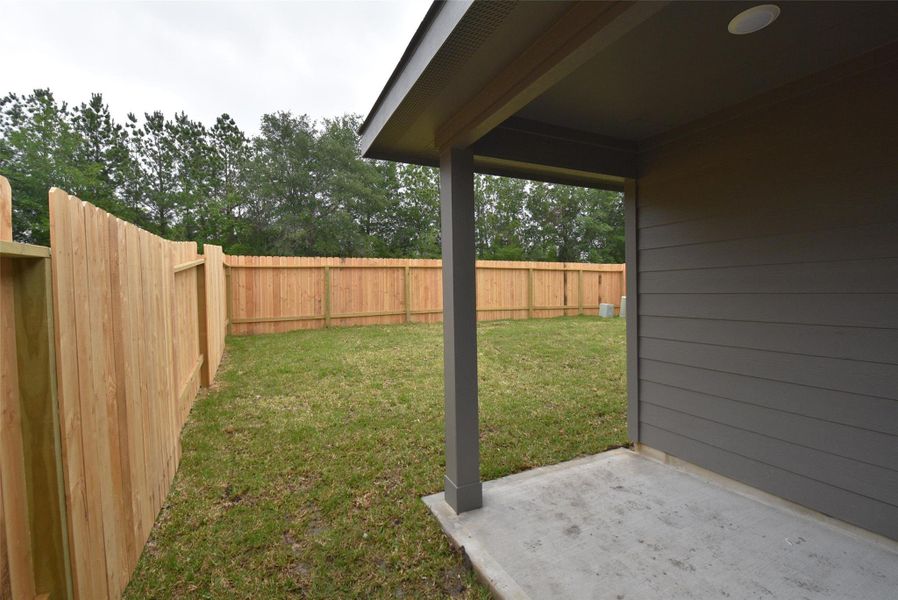 Exterior details and patio area of a home in , Houston (Image 4). Exterior details and patio area of a home in , Houston (Image 4).