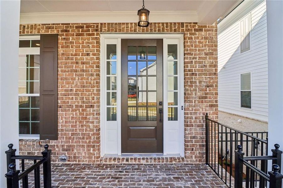 Exterior details and patio area of a home in Brackley Single Family, Cumming (Image 4). Exterior details and patio area of a home in Brackley Single Family, Cumming (Image 4).