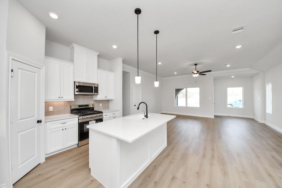 Furnished interior view inside a new home in Lexington Heights, Willis (Image 6). Furnished interior view inside a new home in Lexington Heights, Willis (Image 6).