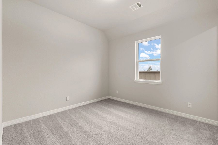 Secondary bedroom. Sample product photo. Actual exterior and interior selections may vary by homesite. Photo may be virtually staged.