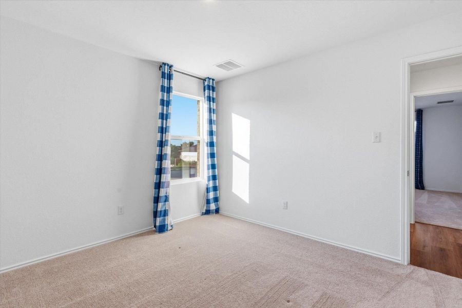 Spacious, unfurnished interior of a new home in Thunder Rock: Watermill Collection, Marble Falls (Image 32).