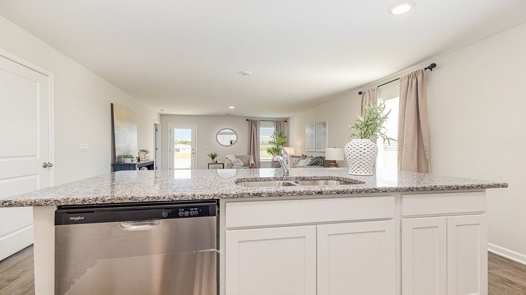 Representative furnished interior of a home built from the Devon by D.R. Horton in Pinewood Estates, Conway (Image 6).