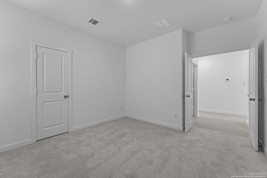 Spacious, unfurnished interior of a new home in Waterwheel: Coastline Collection, San Antonio (Image 20).