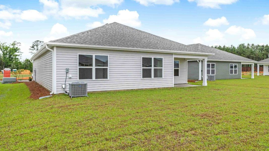 Exterior details and patio area of a home in Sidbury Station, Castle Hayne (Image 3).