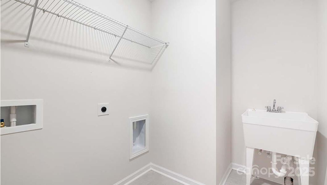 Furnished interior view inside a new home in Falls Cove, Troutman (Image 6).