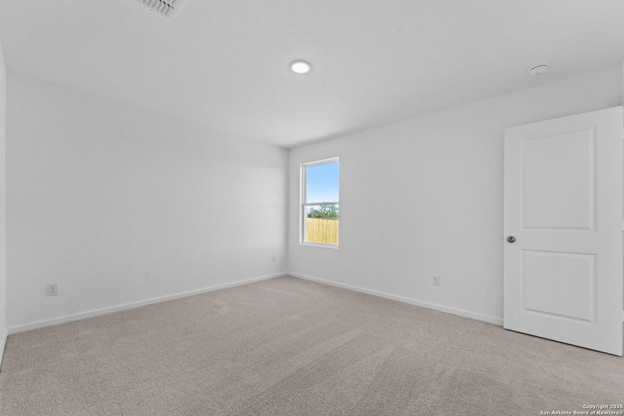 Spacious, unfurnished interior of a new home in Randolph Crossing: Cottage Collection, Converse (Image 21).