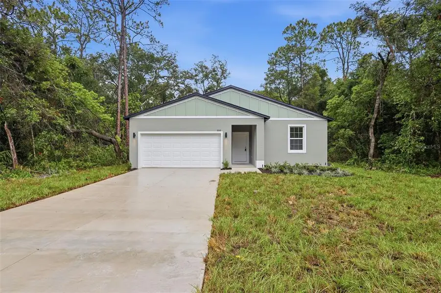 Front exterior of a new home in , Mount Plymouth, FL, highlighting curb appeal (Image 2). Front exterior of a new home in , Mount Plymouth, FL, highlighting curb appeal (Image 2).