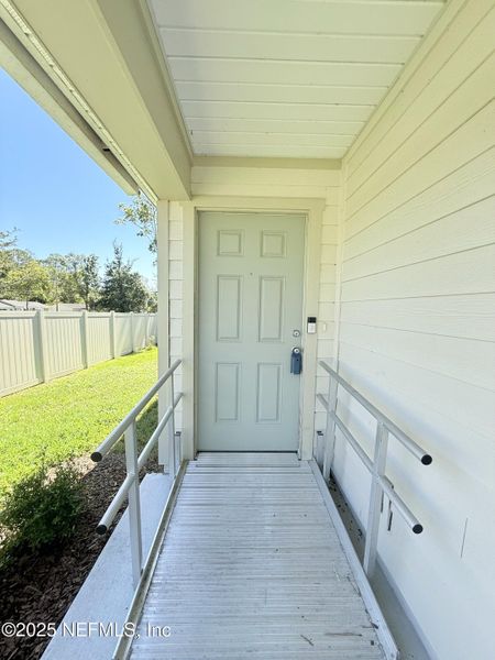 Exterior details and patio area of a home in Pinewood Place, Middleburg (Image 3).