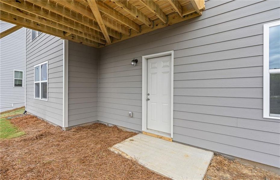 Exterior details and patio area of a home in Sierra Creek, Hoschton (Image 34).
