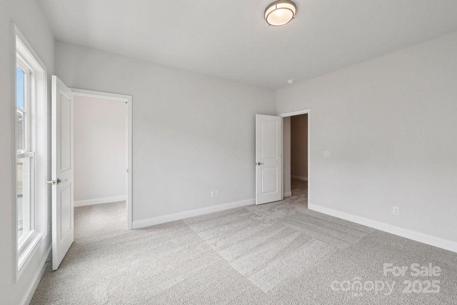 Spacious, unfurnished interior of a new home in Walk23, Huntersville (Image 33).