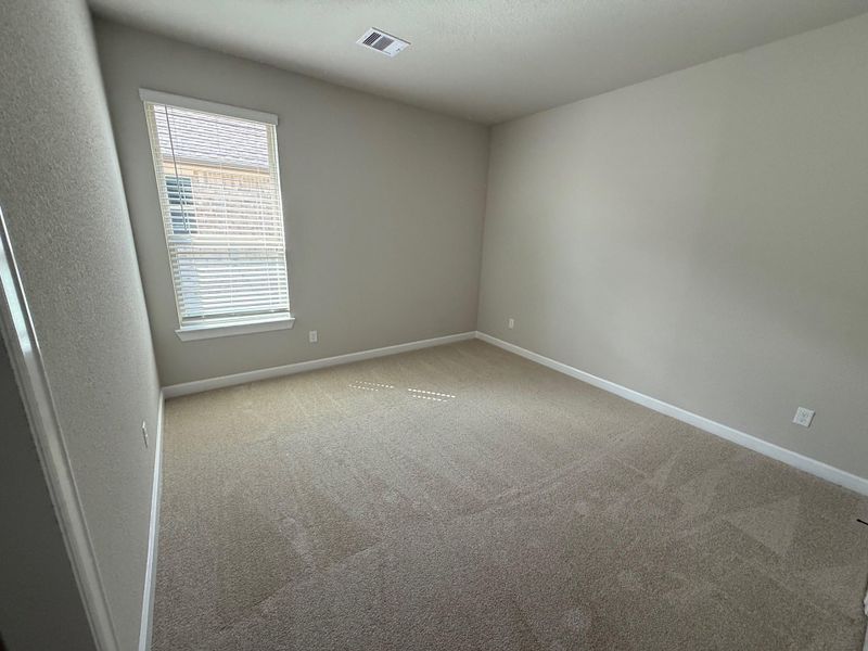 Spacious, unfurnished interior of a new home in Wellborn Settlement, College Station (Image 17).