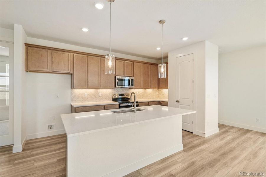 Furnished interior view inside a new home in Legato, Commerce City (Image 10).