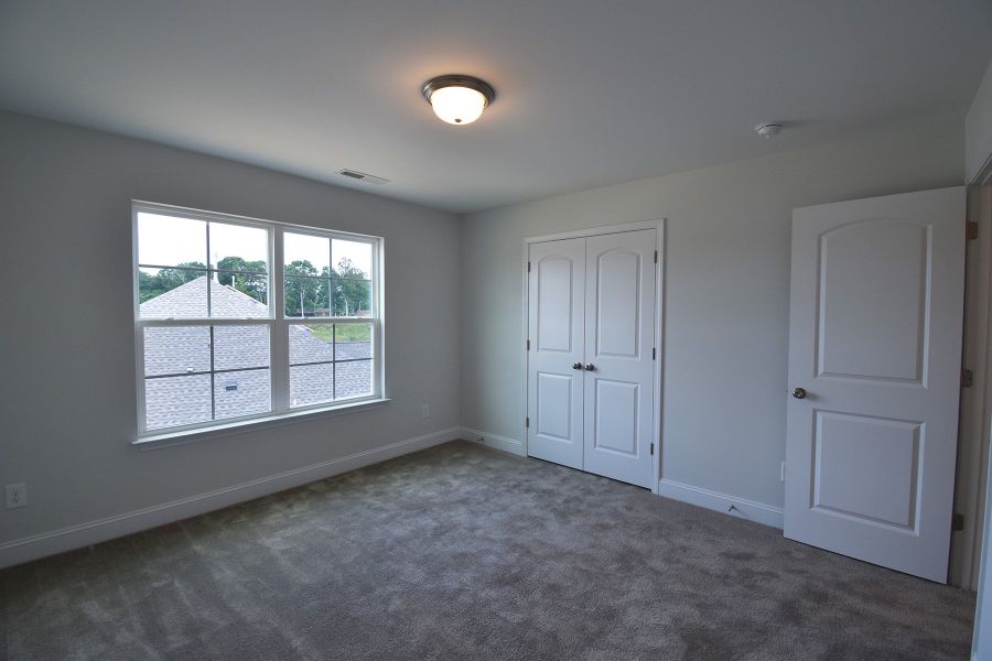 Representative unfurnished interior of a home built from the Ellerbe by Keystone Homes NC in Sullivans Reserve, Walkertown (Image 33).